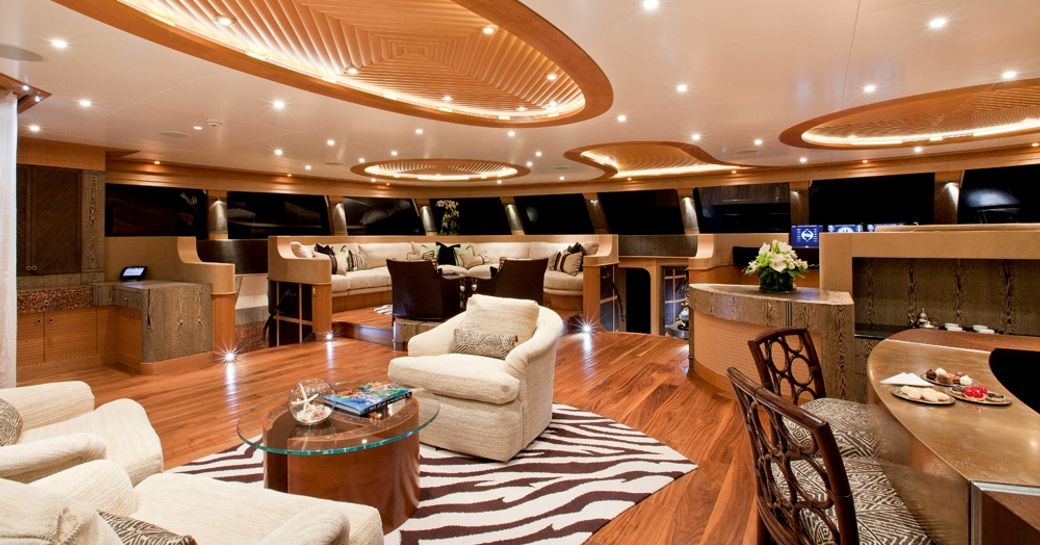 Polynesian-inspired main salon aboard charter yacht HEMISPHERE