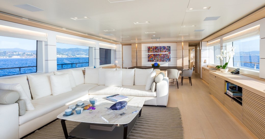 sumptuous sofa in the main salon of charter yacht NARVALO 