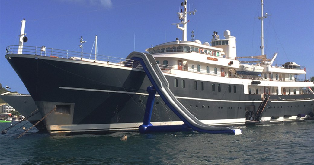 Motor yacht SHERAKHAN with an inflatable slide attached to its sundeck