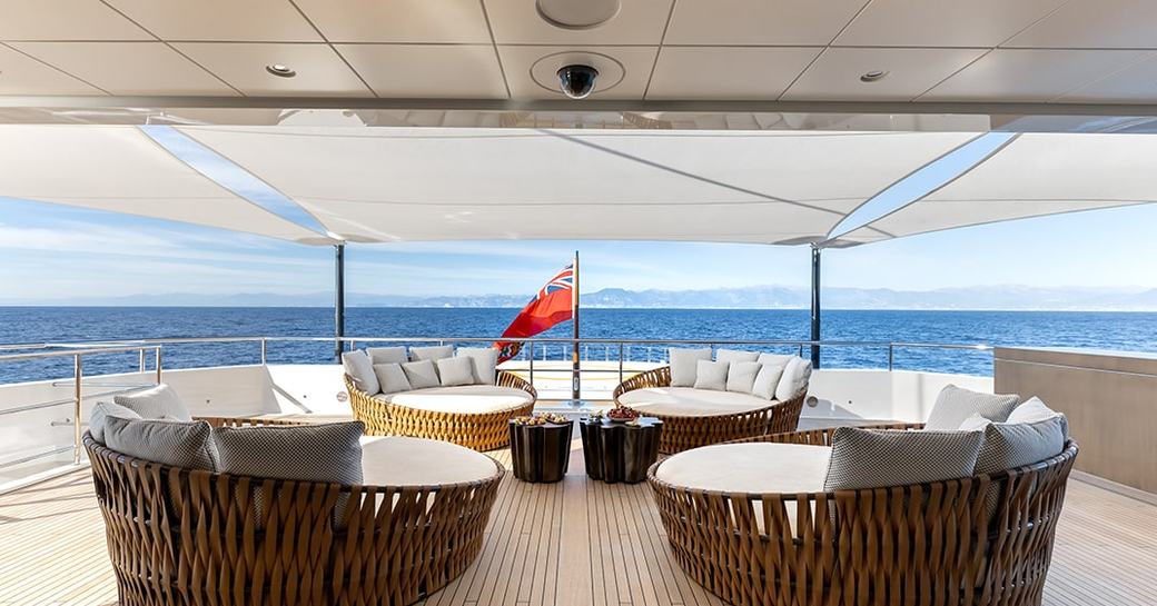 Exterior seating arranged facing in onboard charter yacht LA DATCHA