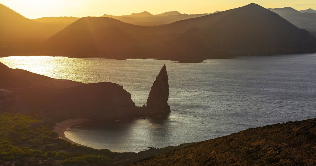 Pinnacle Rock at dusk on Bartolome beach, Galapagos