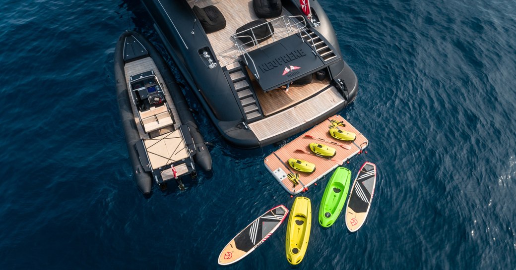 Aft view of charter yacht NEOPRENE from above with water toys behind