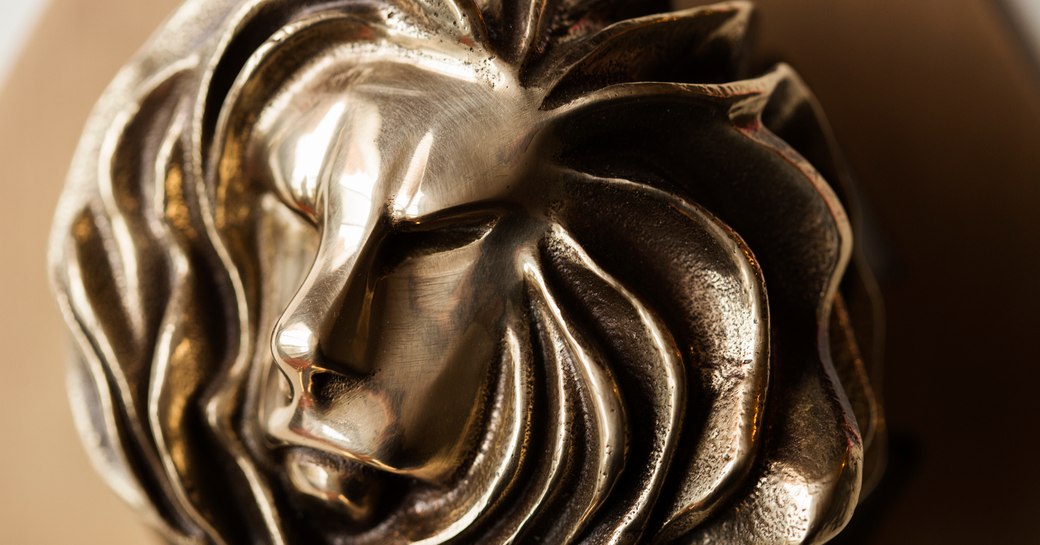 Close up image of a Cannes Lions trophy, in the shape of a lion.