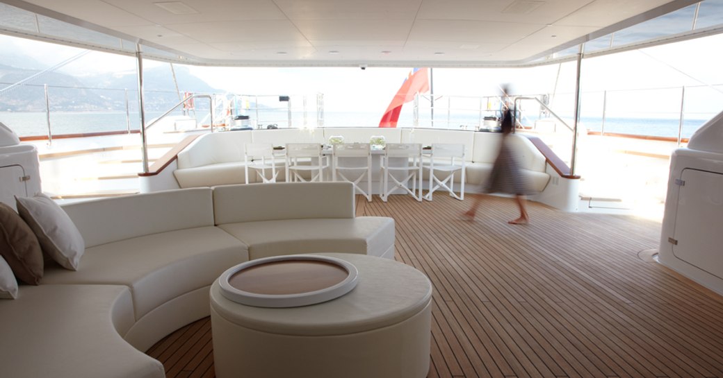 aft deck of sailing yacht panthalassa, with seating and al fresco dining