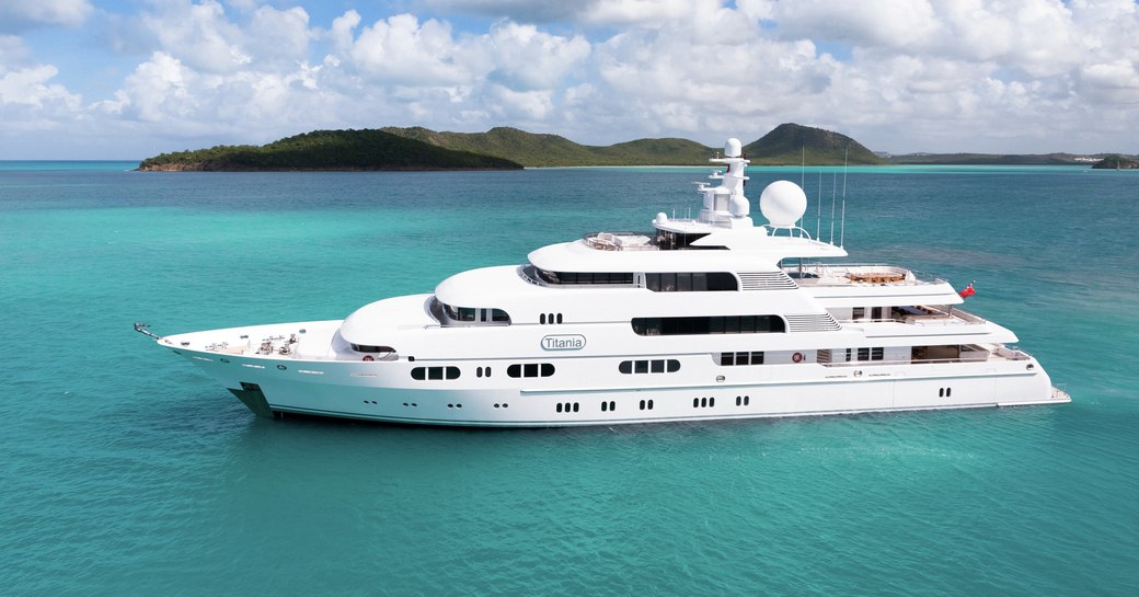 superyacht titania at anchor in the Bahamas where her charter guests are enjoying a self isolating yacht charter vacation during this covid-19 pandemic