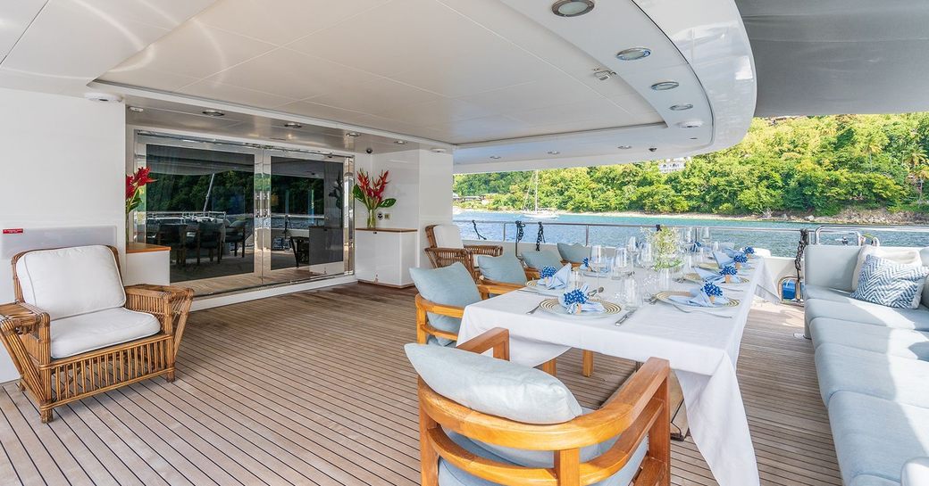 Alfresco dining area onboard charter yacht OCEANOS