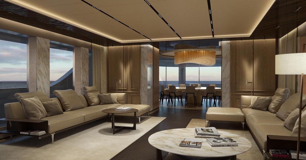 THE SPACIOUS AND AIRY MAIN SALON OF SUPERYACHT GECO OVERLOOKING THE WATER