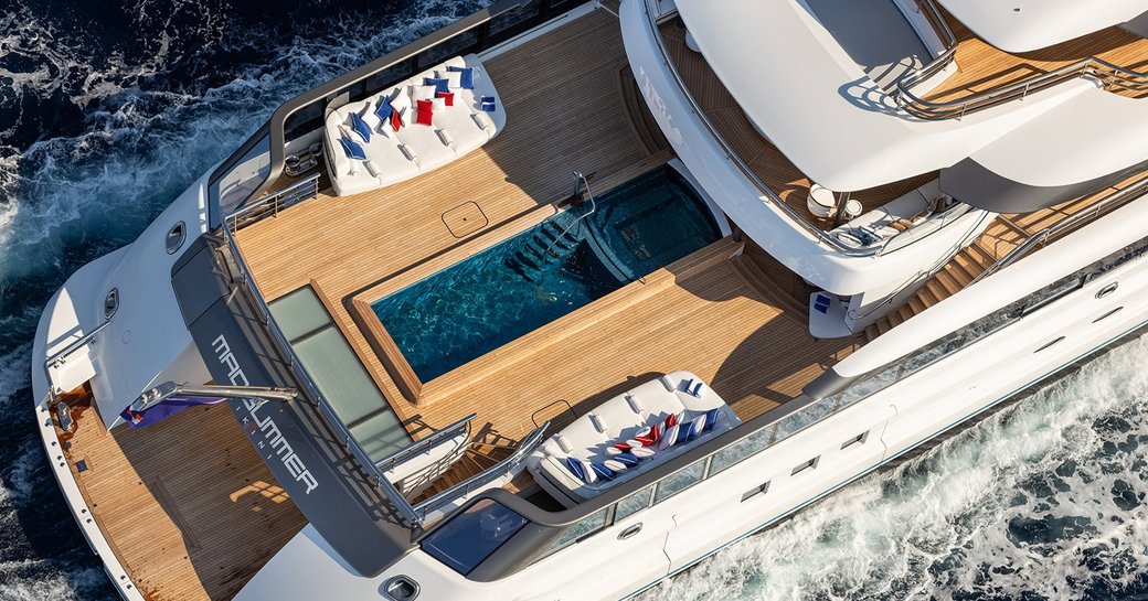 aerial shot of 12 meter luxury swimming pool and swimming platform of charter yacht Madsummer 