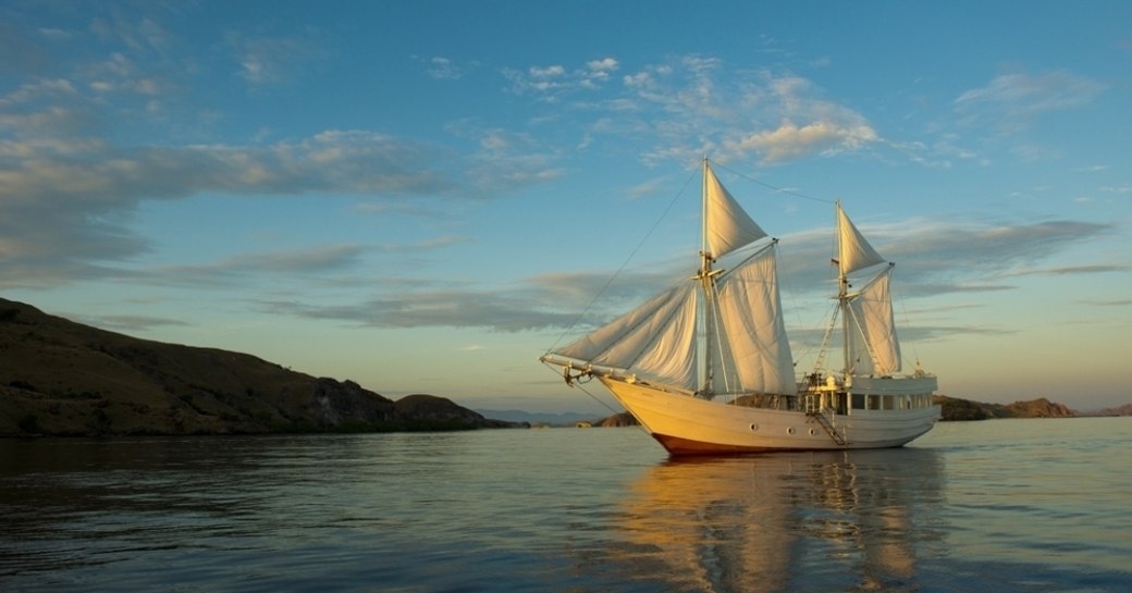 luxury yacht ALEXA anchored in the beautiful waters of Indonesia