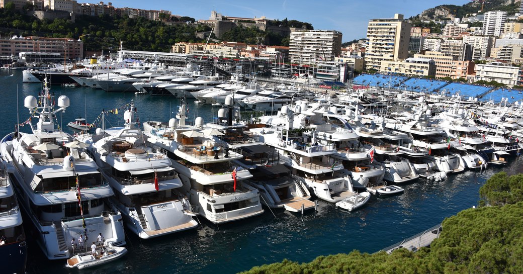 superyachts along the dock at port hercules in monaco