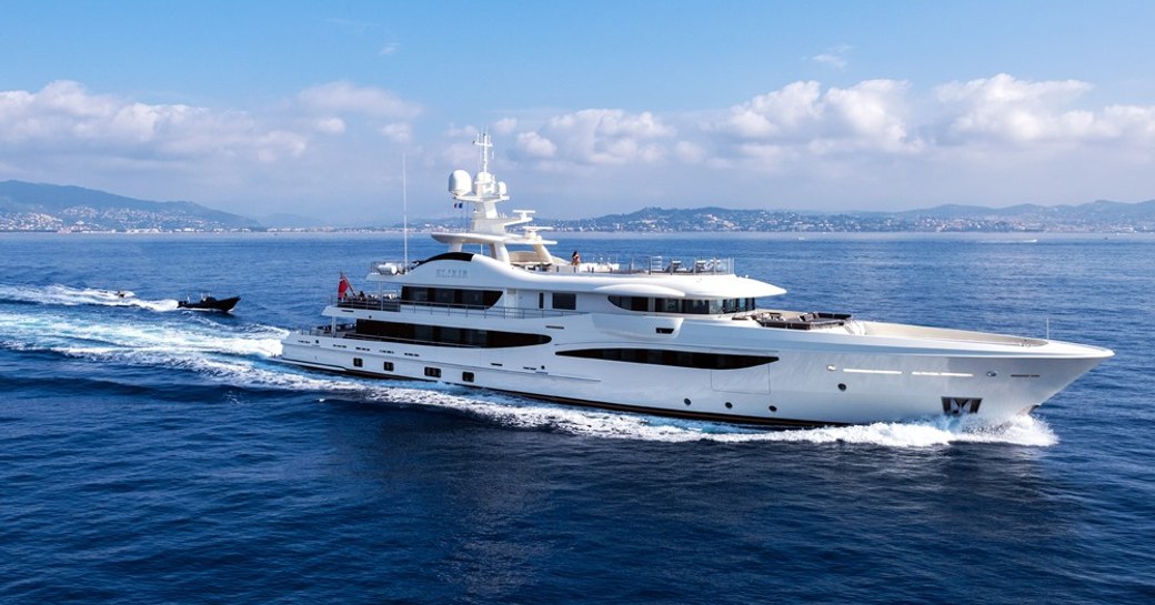 superyacht Elixir underway ahead of tender on a luxury yacht charter in the Mediterranean