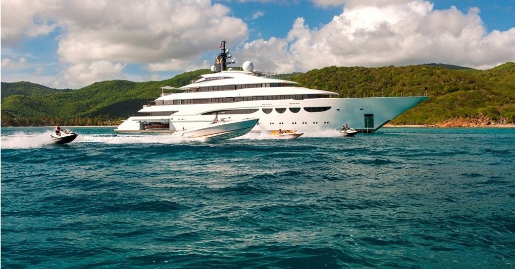 superyacht QUATTROELLE alongside tenders and water toys