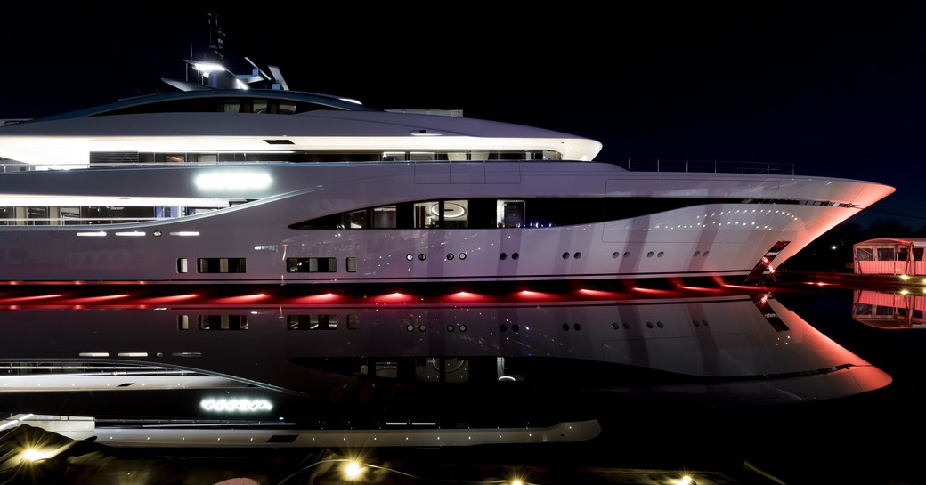 Feadship yacht ARROW at night