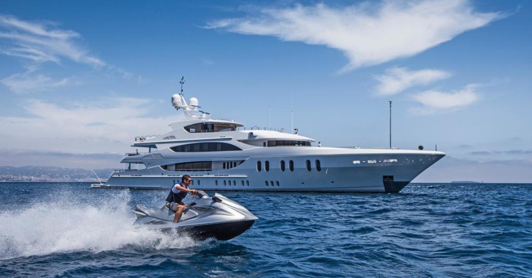 M/Y Lady Sara underway with an attendant Jetski