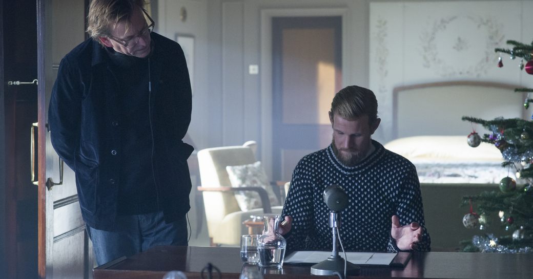 Actors in Netflix The Crown communicating onboard a replica of the Royal Yacht Britannia