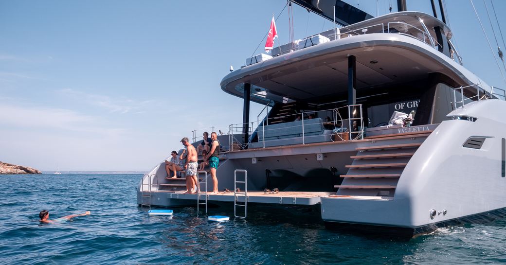 Charter yacht SHADES OF GREY aft deck with steps and swim platform