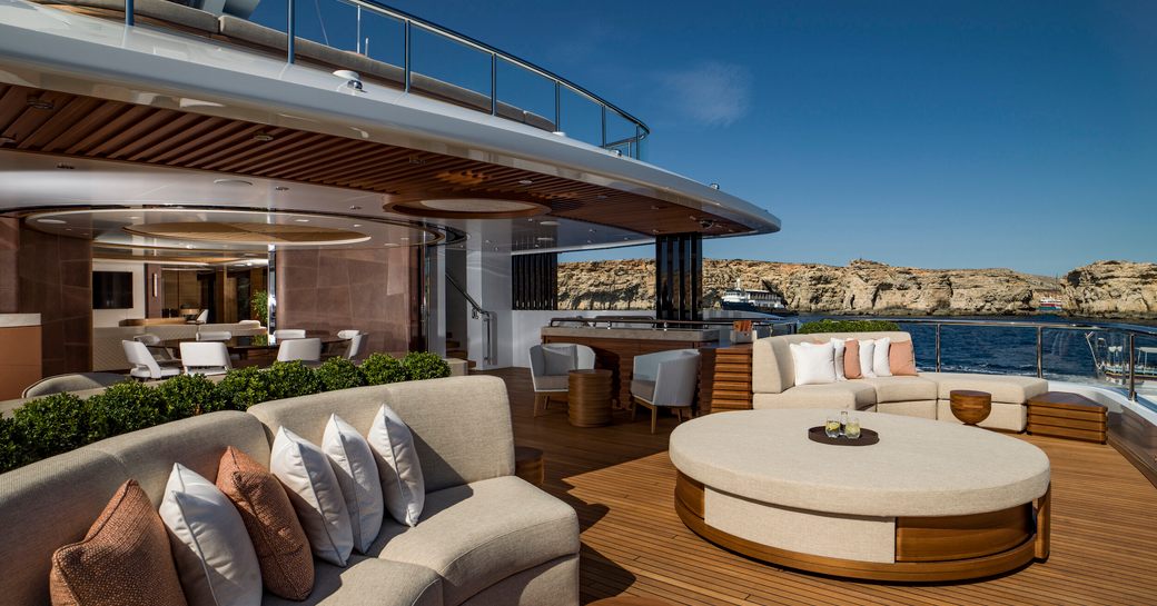 Exterior seating area onboard charter yacht LIFE SAGA