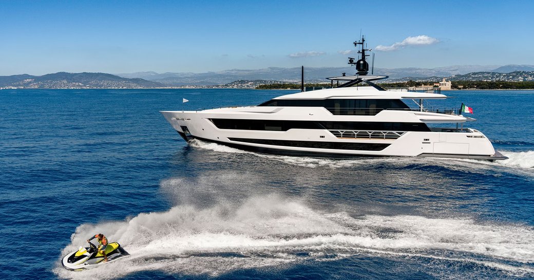 Charter guest on a Jet Ski with charter yacht CANOE CANOE