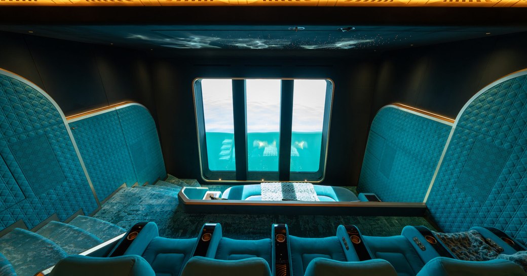 Interior cinema onboard charter yacht KISMET with plush teal fittings