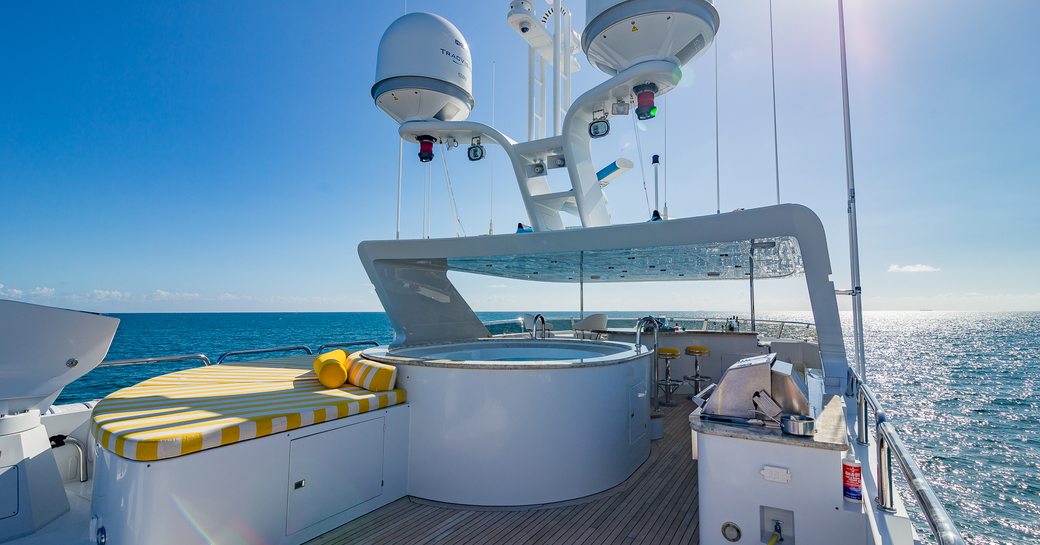 Charter yacht I LOVE THIS BOAT sundeck with Jacuzzi and striped sunpads