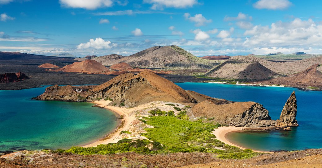 View of two beaches of Bartolome Island in Galapagos Islands National park. Pinnacle Rock. 