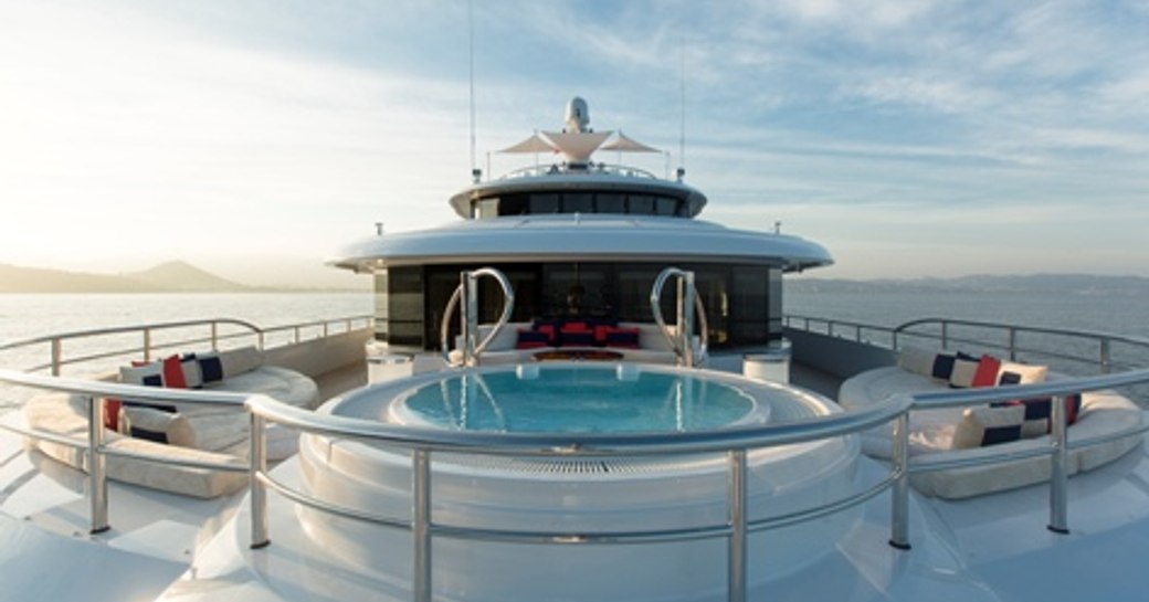 An image showing the Jacuzzi and sundeck of luxury yacht 'Mine Games'