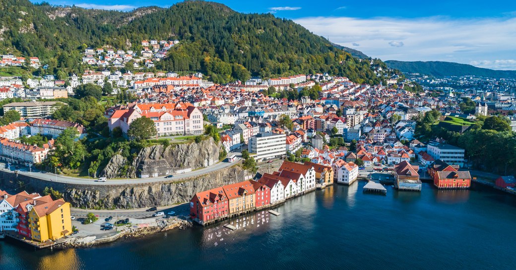 pastel colored houses on the waterfront in norway