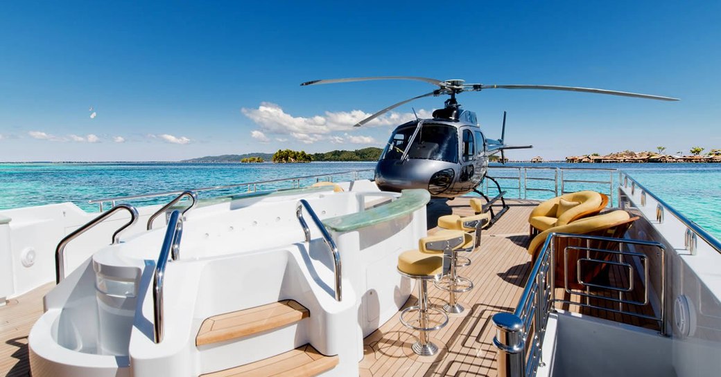 Helicopter on sundeck of superyacht on my seanna