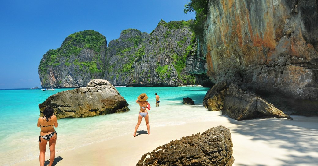 sunbathers on Maya Bay, Andaman Sea, Thailand