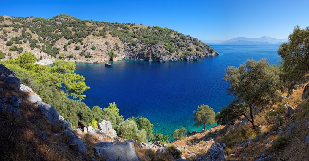 secluded bay with turquoise waters in the superyacht cruising grounds of Turkey