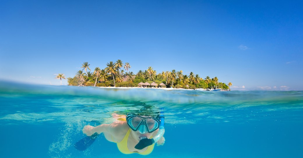 Snorkeller in Bora Bora lagoon