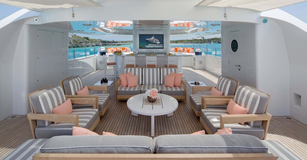 the luxurious sundeck of charter yacht time for us in the bahamas