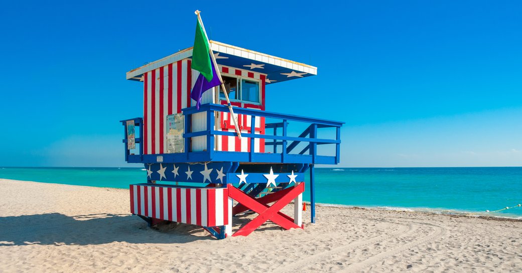 Patriotic beach hut on a sandy beach in USA