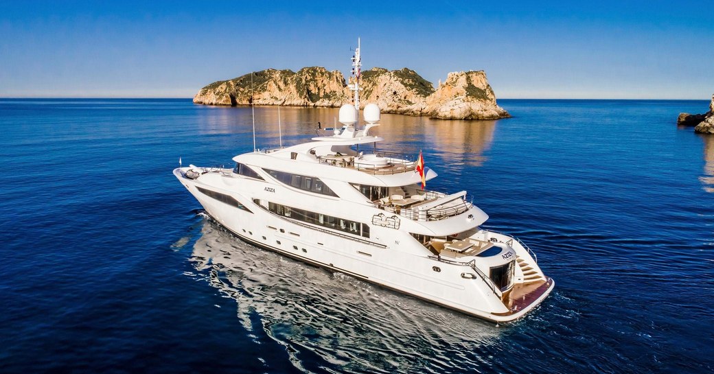 a superyacht cruises in some calm and quiet waters where they are away from major social spaces so the charterers can't contract coronavirus while on their luxury yacht charter 