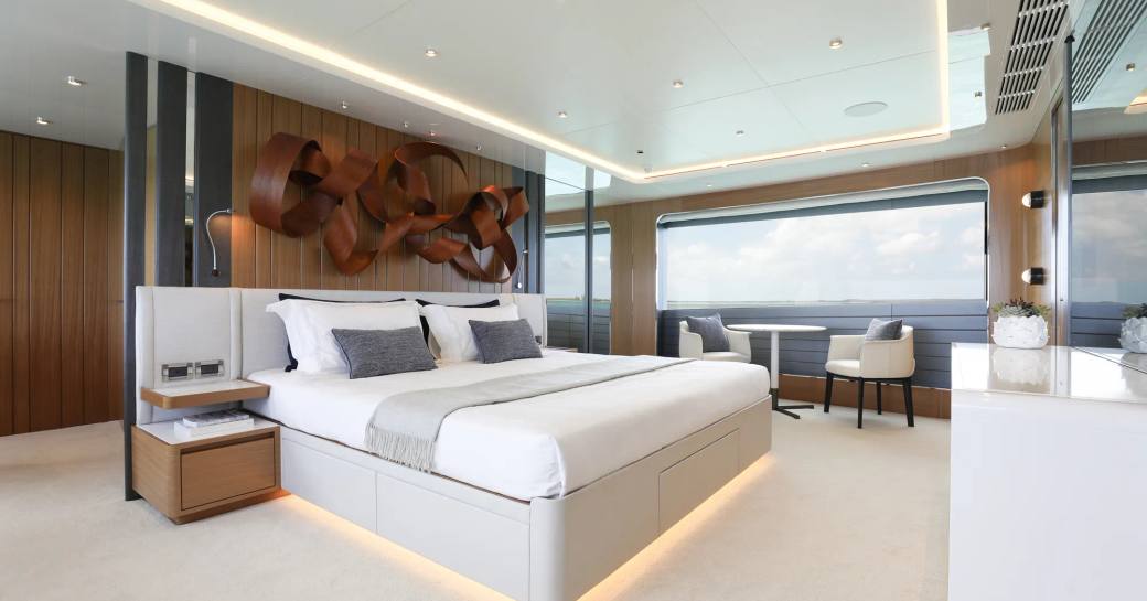 Master cabin overview with central berth and large windows onboard charter yacht A SALT WEAPON