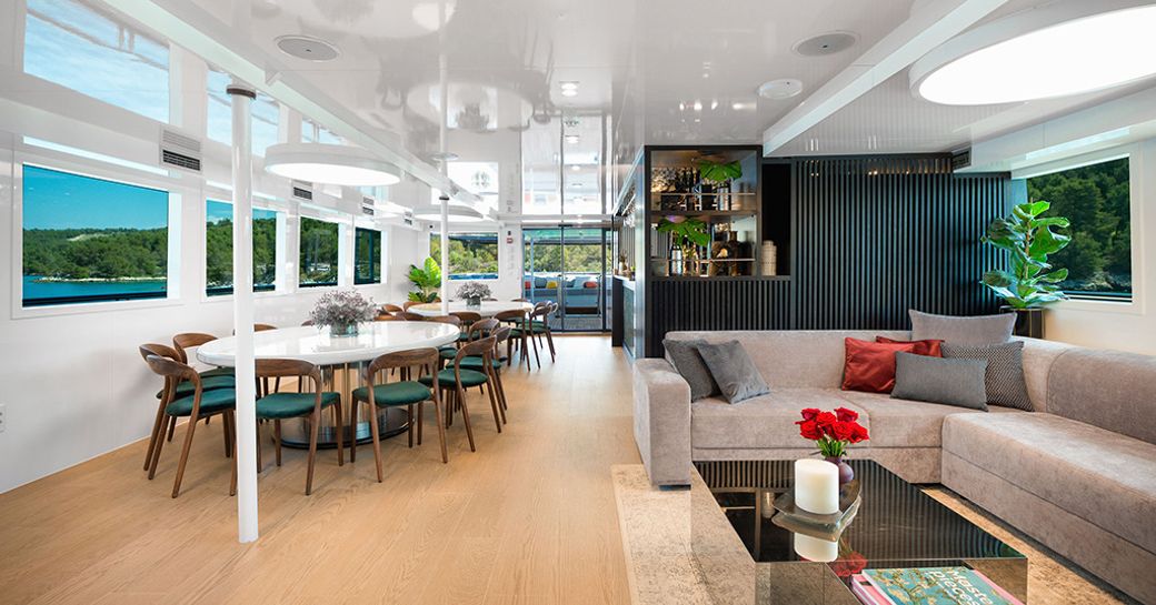 Main salon onboard charter yacht AGAPE ROSE