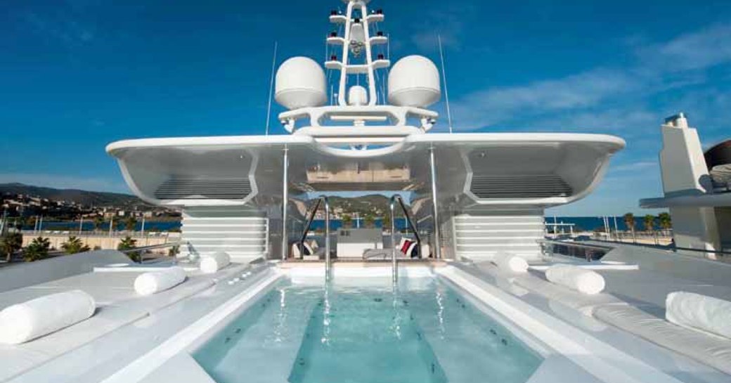 Large pool on superyacht Triple 7