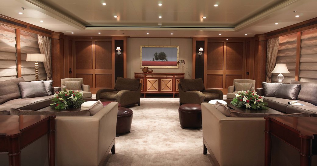 elegant main salon with seating areas aboard superyacht UTOPIA 