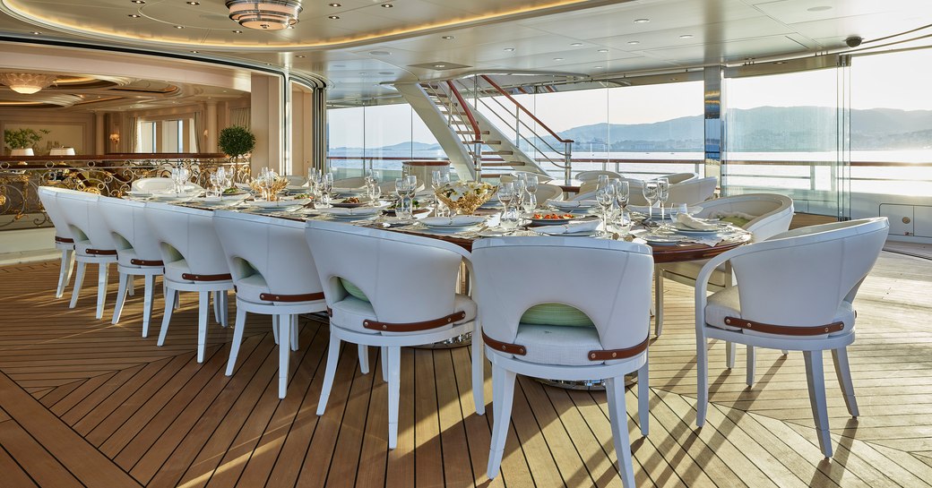 Aft deck dining set-up on luxury yacht TIS