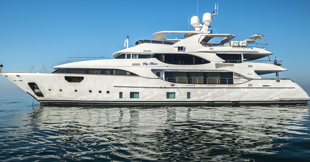 Luxury yacht Soy Amor profile shot anchor