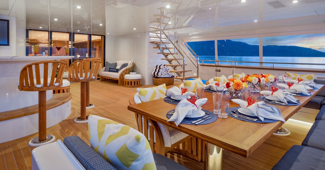 alfresco dining and bar on the aft deck of superyacht Endless Summer