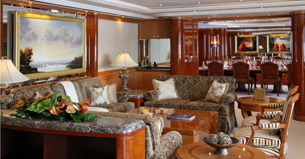 high gloss anigre and maple burl main salon on board luxury yacht CAPRI 