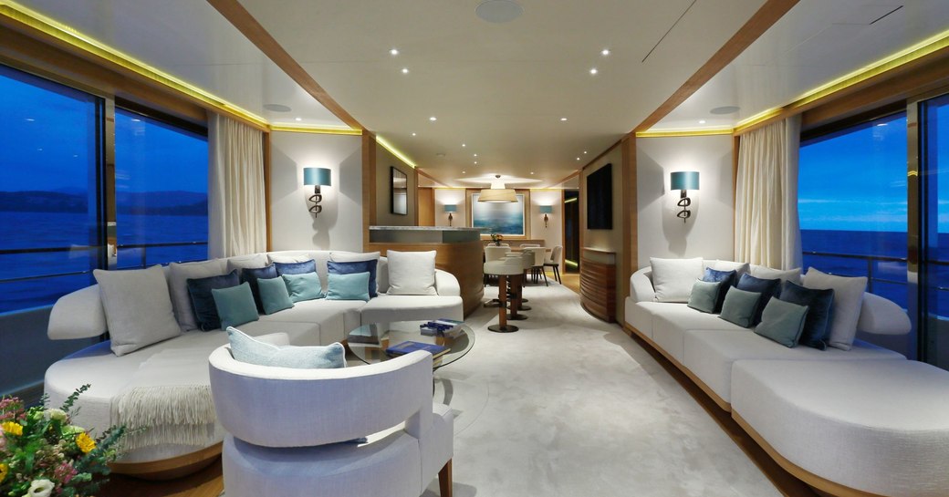 curvaceous sofas in the main salon of luxury yacht SOLIS 