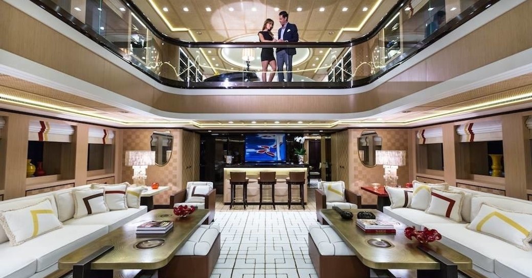 The split-level main salon and bar featured on board M/Y AXIOMA