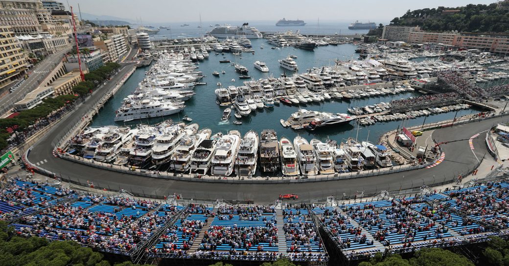 Port Hercules marina in Monaco, with charter yachts lined up opposite the track waiting for the Monaco Grand Prix to begin