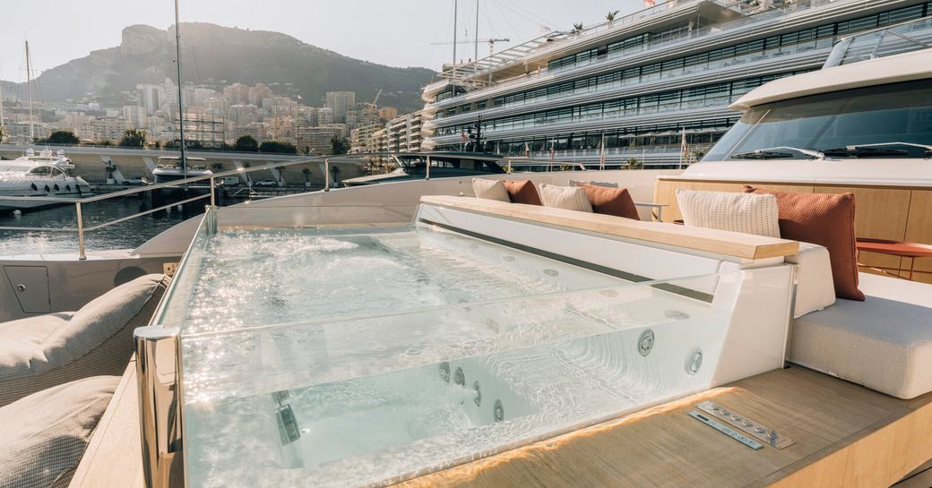 Jacuzzi with glass sides onboard charter yacht ANDIAMO