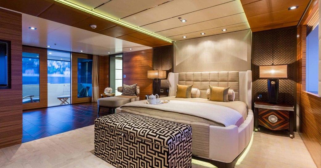 Owners cabin on superyacht W with side opening balcony 