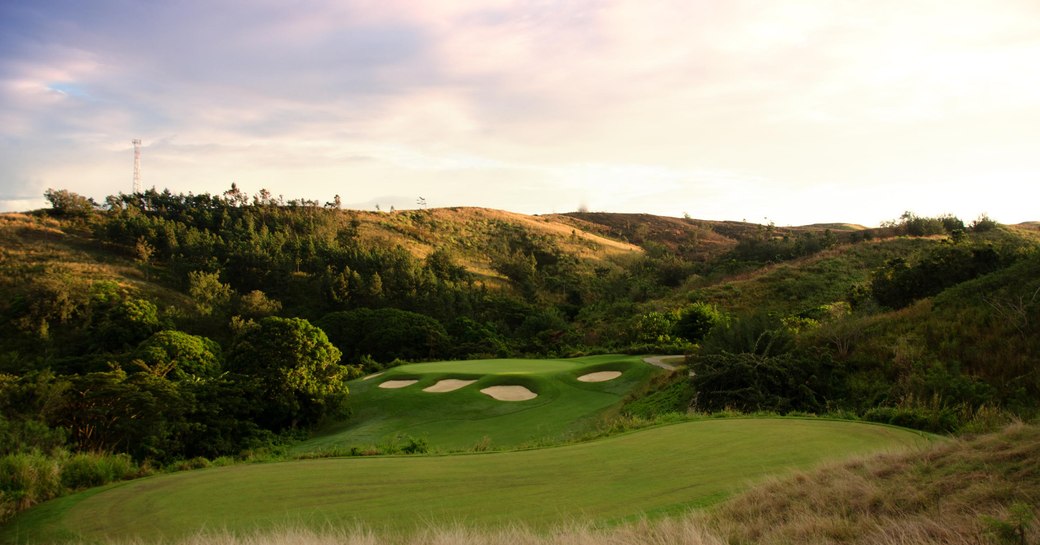 sun sets on Natadola Bay Championship Golf Couse in Fiji