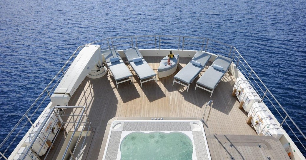 motor yacht SERENITAS's deck Jacuzzi and sun loungers