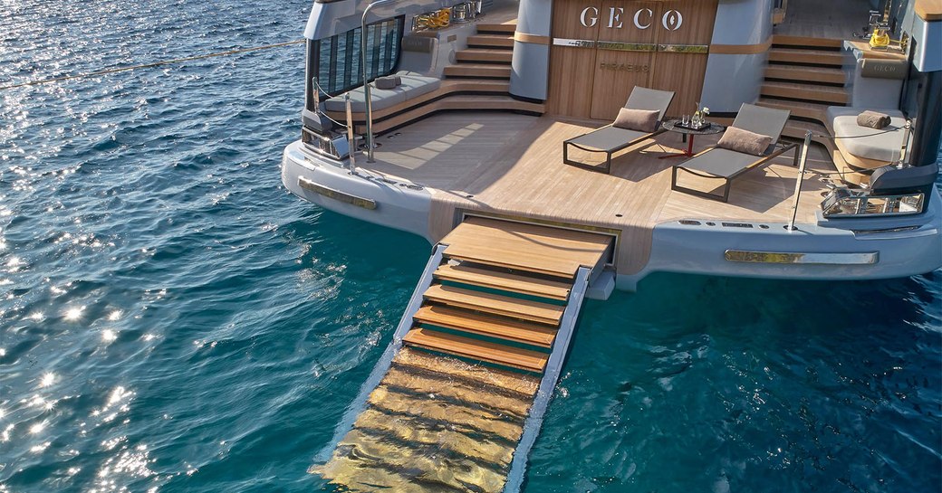 geco yacht with steps leading to the sea